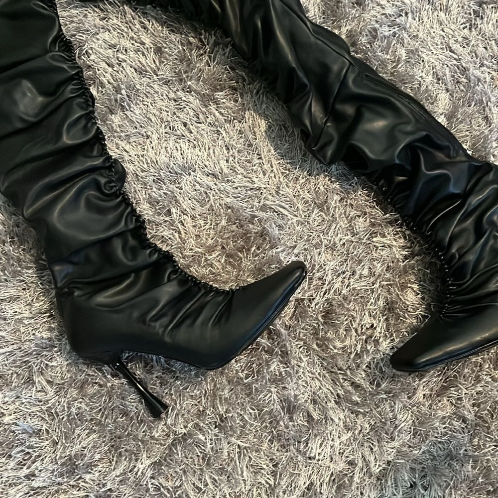 Black faux leather boots